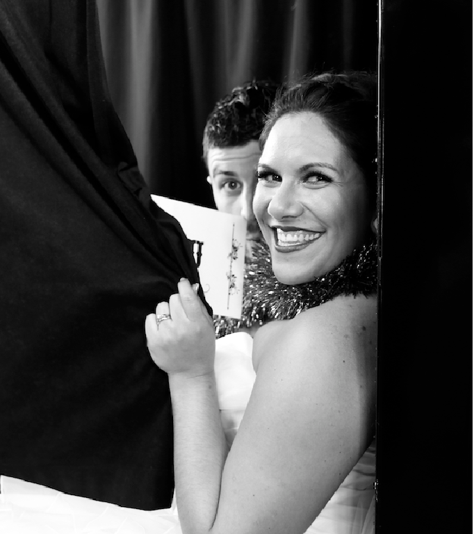Bride and groom in the photo booth in Auckland